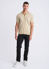 Beige honeycomb textured knit polo shirt with short sleeves and button front detail
