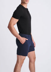 Navy blue textured stretch knit chino shorts with a modern cut and subtle side pockets for casual wear