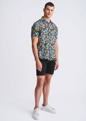 Men’s short-sleeved button-up shirt with vibrant multicolored floral pattern on dark lightweight linen tencel fabric