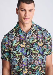 Floral lightweight linen tencel short sleeve shirt with vibrant green blue yellow and purple floral pattern on dark background