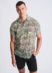 A vibrant short-sleeved button-up shirt with psychedelic green pink and white swirl pattern in lightweight cotton silk