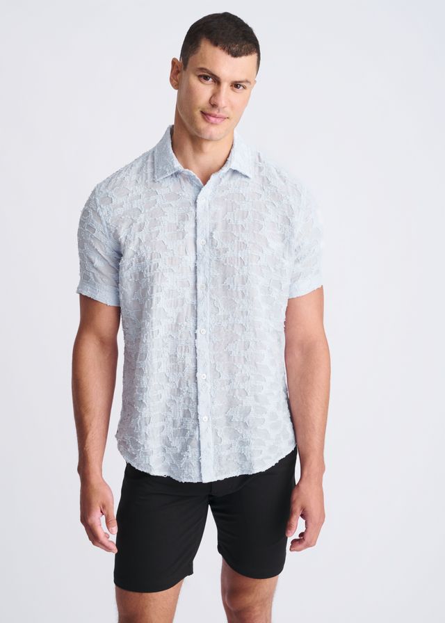 Light blue lightweight jacquard short-sleeved shirt with a subtle textured pattern perfect for warm weather