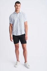 Light blue lightweight jaquard short-sleeved shirt with a subtle floral pattern perfect for warm weather wear