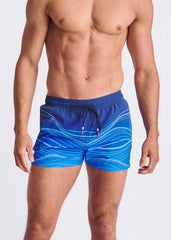 Blue swim shorts with white wavy print black drawstring ties and mesh lining for comfortable beachwear