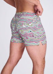 Swirls print seersucker swim shorts with mesh lining in vibrant pink green and white psychedelic wavy abstract design