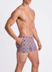 Medallions seersucker swim shorts with mesh lining featuring purple red and gray geometric patterned swim trunks