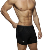 Black pocket long mesh rocky athletic shorts with a subtle logo on the lower left leg made of breathable mesh