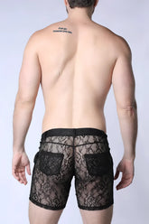 Black lace shorts positan with intricate floral patterns and solid black fabric accents at waistband and pockets