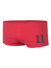 Red swim trunks pride 11 brief featuring black number 11 on the side for swimming and beachwear