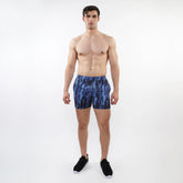 Printed mesh stretch performance shorts in blue tie-dye with a modern abstract athletic pattern