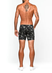 Printed stretch knit shorts in black and gray camouflage featuring a comfortable stretch knit fabric