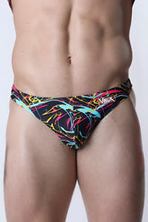 Vaux pulse swim thong featuring neon pink yellow and cyan abstract lines on black for men’s swimwear