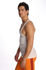 A man wearing a white racer-back yoga tank with thin straps and a v-neckline in a form-fitting design