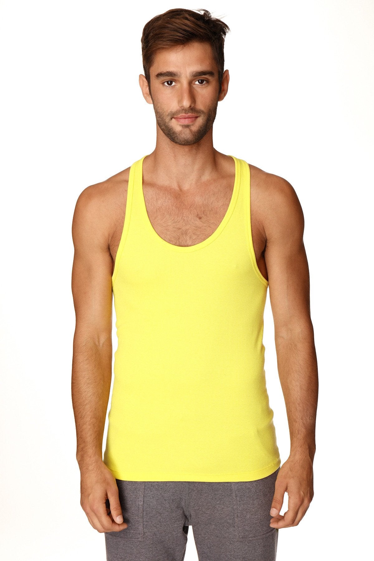 Bright yellow racerback yoga tank top with sleeveless fitted design ideal for activewear and workouts