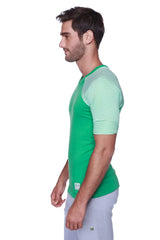 Green raglan virtual crew neck baseball t-shirt with light green and white striped sleeves for casual wear