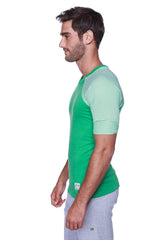 Green raglan virtual crew neck baseball t-shirt with light green and white striped sleeves for casual wear