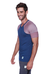 Blue and pink color-blocked athletic v-neck t-shirt featuring raglan sleeves in royal blue with red and grey stripe