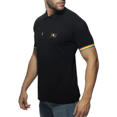 Black rainbow polo shirt with rainbow-striped cuffs and a small colorful logo on the chest