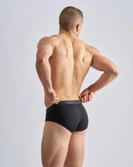 Reign brief black briefs with dark gray elastic waistband designed for comfortable all-day wear