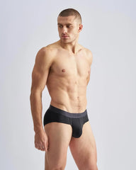 Black men’s briefs reign brief with dark gray waistband featuring team branding in white lettering