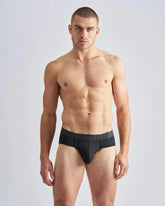 Black reign brief with smooth form-fitting design and subtle elastic waistband made from soft stretch fabric