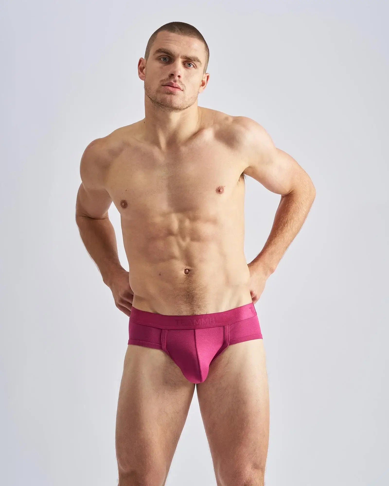 Vibrant fuchsia reign brief athletic briefs with sleek form fitting design and smooth fabric waistband