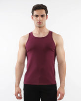 A maroon rib stretch tencel cotton sleeveless tank top with a simple fitted design for casual wear
