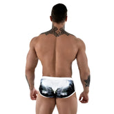 White swim trunks with black and gray palm tree print by roberto lucca in size 2xl for beachwear