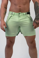 Romey shorts in light green with sleek fit and black belt accents featuring a modern design