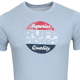 Light blue heathered cotton ruff riders superior brand short sleeved t shirt with distressed circular graphic