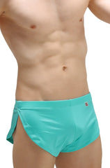 Turquoise running shorts joe green with side slit and small red logo on waistband designed for active use