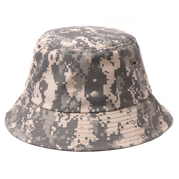 Canvas bucket hat in digital camouflage with wide brim and adjustable strap made from durable fabric