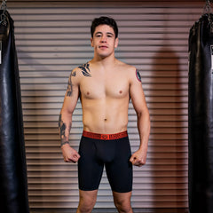 Black sheath v men’s 8-inch sports performance boxer brief with red greek key waistband for athletic use