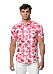 A man wearing a floral print open knit short-sleeved button-up shirt with vibrant pink flowers on white background
