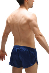 Navy blue satin shorts with elastic waistband featuring a jockstrap design in a sleek satin material