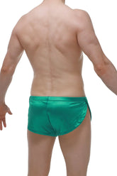 Shiny emerald green satin swim trunks known as short snap satin green with a smooth glossy finish