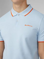Light blue pique signature polo shirt with orange trim and ben sherman embroidered logo for casual wear