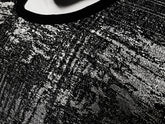 Black lace silver leaf tee with intricate textured pattern showcasing elegant sheer design