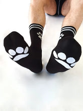Black sk8erboy puppy socks with white paw prints on toes and striped cuffs size 39-42