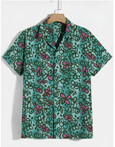 Teal sketchbook cosmos s s shirt with vibrant pink and dark green floral pattern on short sleeved hawaiian fabric