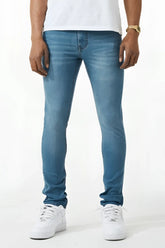 Skinny fit denim jean in blue with slim fit and subtle fading made from denim material