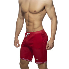 Red mesh slam bermuda shorts with white drawstring and trim designed for athletic use