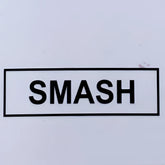 Black smash sticker with bold uppercase lettering inside a rectangular border on the smash gossamer lace top product