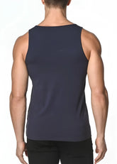 Dark navy blue solid stretch jersey sleeveless tank top showing back with subtle brand logo on upper back
