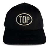 Black spunky monkee cap with white embroidered top logo in an oval on the front panel