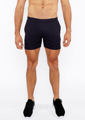 Black textured mesh stretch performance shorts with comfortable elastic waistband and minimalist design