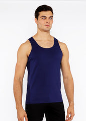 Navy blue sleeveless circle spine laser cut stretch jersey tank top shown from the back side