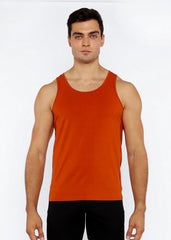 A solid orange stretch jersey tank top with circle spine laser cut detail and a simple round neckline