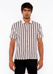 A man wearing a vertical stripe open stretch knit shirt with rib collar in black and off-white colors