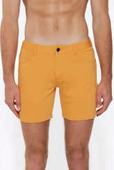 Bright yellow apricot peel st33le stretch knit shorts with black button and classic five-pocket design size 29